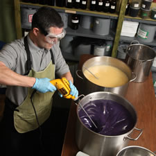 Chris mixing Herbaria soap