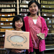 little girls at herbaria soap store