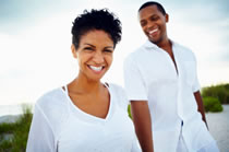 man and woman on beach photo