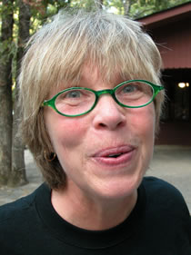 woman with minty green glasses photo